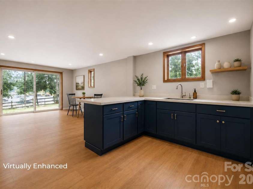 131 Baywatch Drive, Mooresville, NC 28117.  MLS# CAR4420132, YatesRealty ID 48806. Virtually enhanced kitchenette in basement