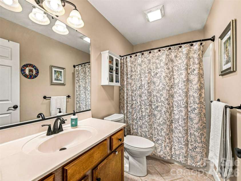 16 Jennlynn Drive, Arden, NC 28704.  MLS# CAR4390488, YatesRealty ID 48816. 