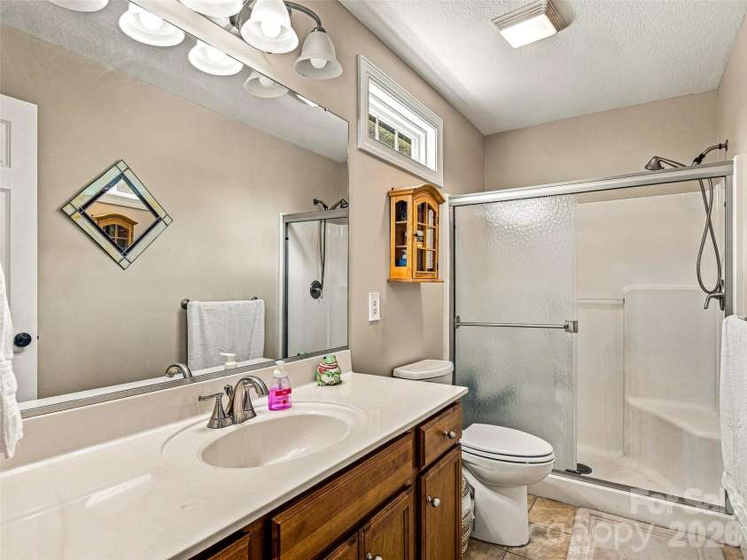 16 Jennlynn Drive, Arden, NC 28704.  MLS# CAR4390488, YatesRealty ID 48816. 