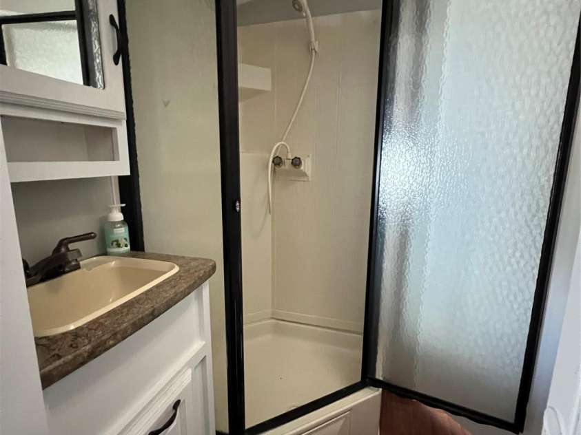 322 Mount View Lane, New London, NC 28127.  MLS# CAR4381016, YatesRealty ID 48820. Bathroom on Camper side