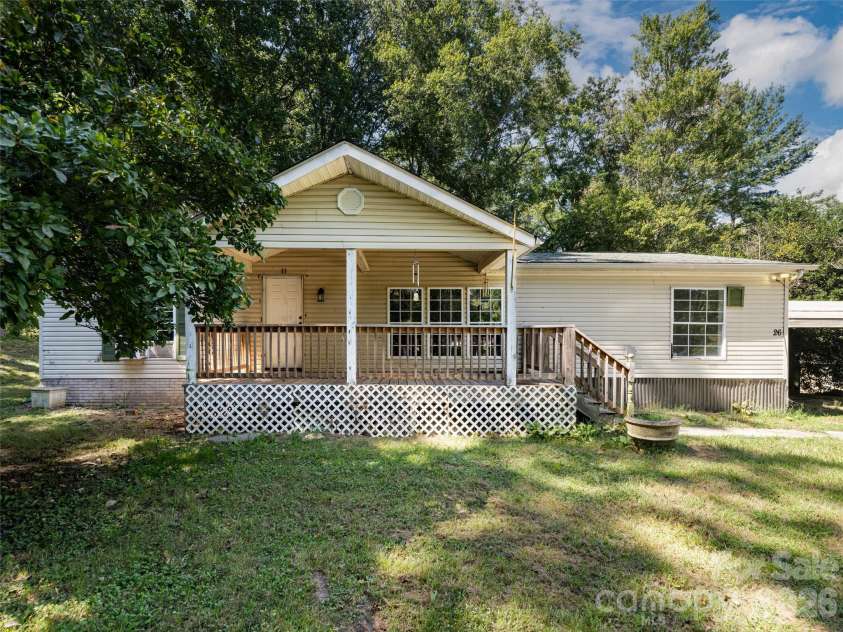 26 Audrey Lane, Asheville, NC 28806.  MLS# CAR4421510, YatesRealty ID 48827. Gracious covered front porch