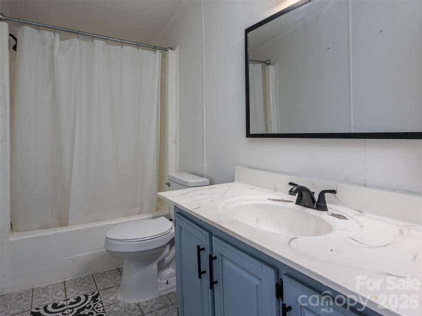 26 Audrey Lane, Asheville, NC 28806.  MLS# CAR4421510, YatesRealty ID 48827. Secondary bathroom
