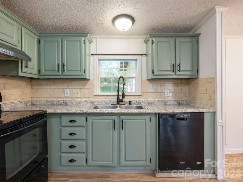 26 Audrey Lane, Asheville, NC 28806.  MLS# CAR4421510, YatesRealty ID 48827. Window over kitchen sink