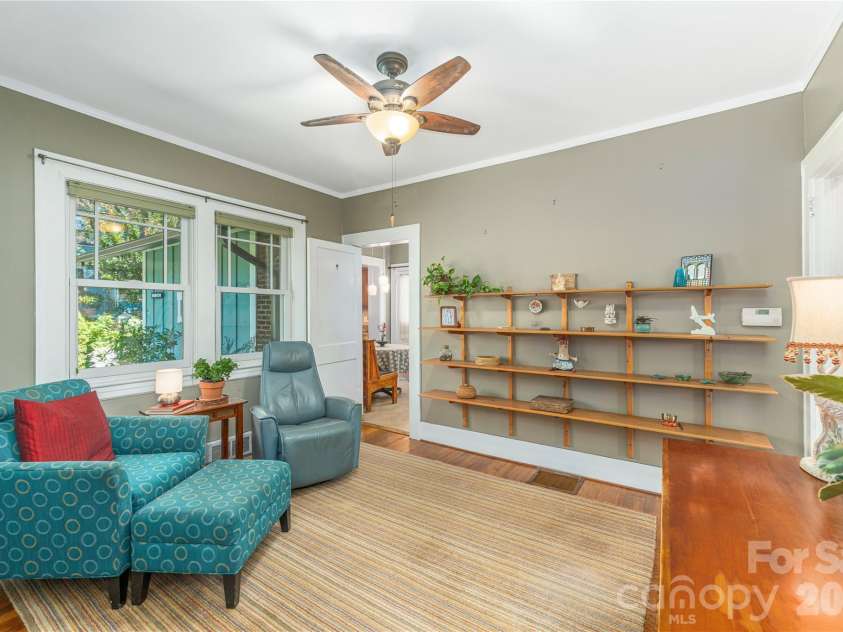 29 Hillside Street, Asheville, NC 28801.  MLS# CAR4416247, YatesRealty ID 48834. Den or Dining With Custom Built-Ins