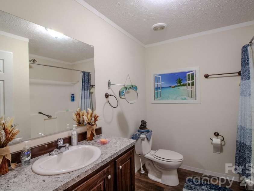 76 Patriot Drive, Waynesville, NC 28786.  MLS# CAR4418358, YatesRealty ID 48836. Hallway Full Bath