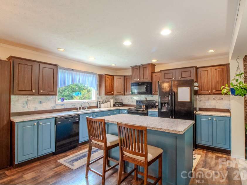 76 Patriot Drive, Waynesville, NC 28786.  MLS# CAR4418358, YatesRealty ID 48836. Kitchen with island
