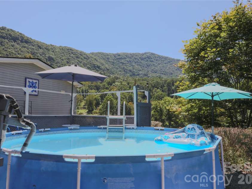 76 Patriot Drive, Waynesville, NC 28786.  MLS# CAR4418358, YatesRealty ID 48836. Pool with a view