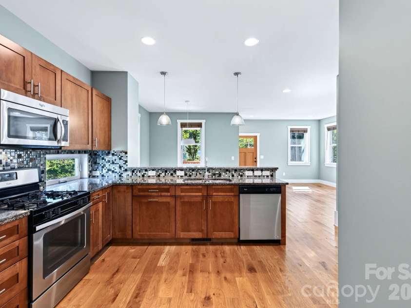 32 Florida Avenue, Asheville, NC 28806.  MLS# CAR4421230, YatesRealty ID 48838. Tile Backsplash and Locally Sourced Woods