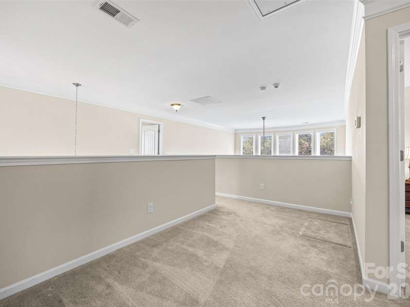 1053 Jack Pine Road, Lake Wylie, SC 29710.  MLS# CAR4420100, YatesRealty ID 48840. Loft area, more flex space.