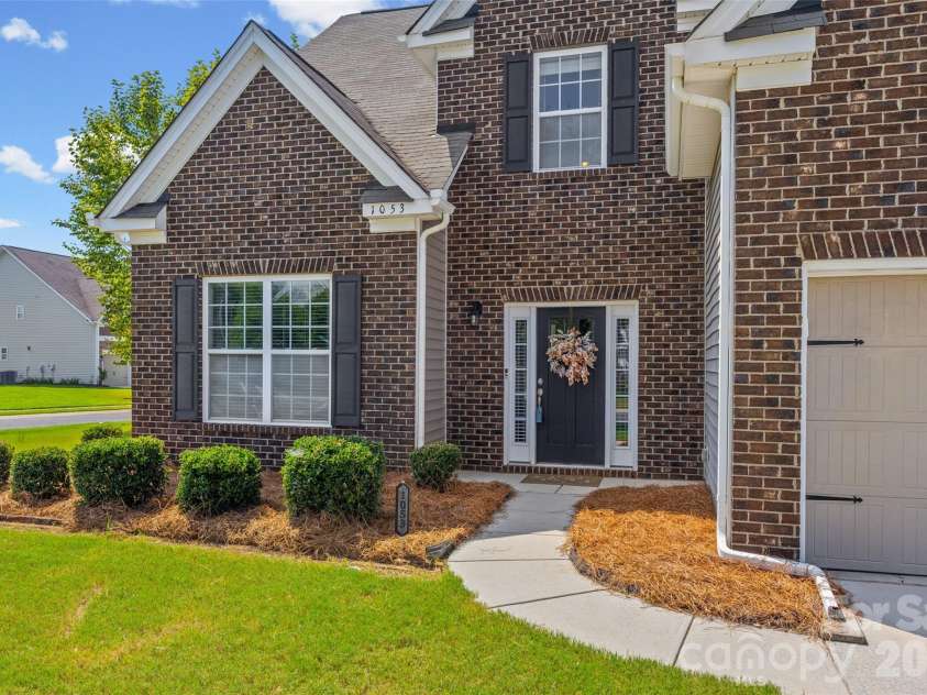 1053 Jack Pine Road, Lake Wylie, SC 29710.  MLS# CAR4420100, YatesRealty ID 48840. Small front porch