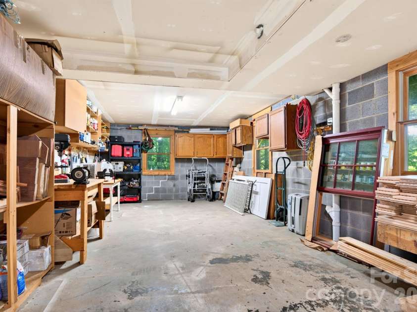 336 Hidden Creek Lane, Burnsville, NC 28714.  MLS# CAR4420241, YatesRealty ID 48843. Exceptional Storage