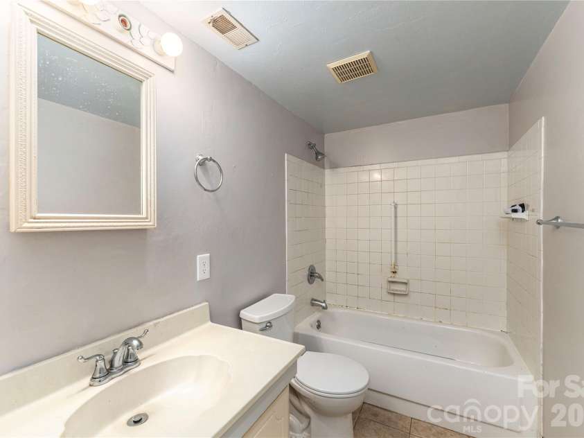 11 Maple Ridge Lane, Asheville, NC 28806.  MLS# CAR4420980, YatesRealty ID 48845. Full bath off two bedrooms.