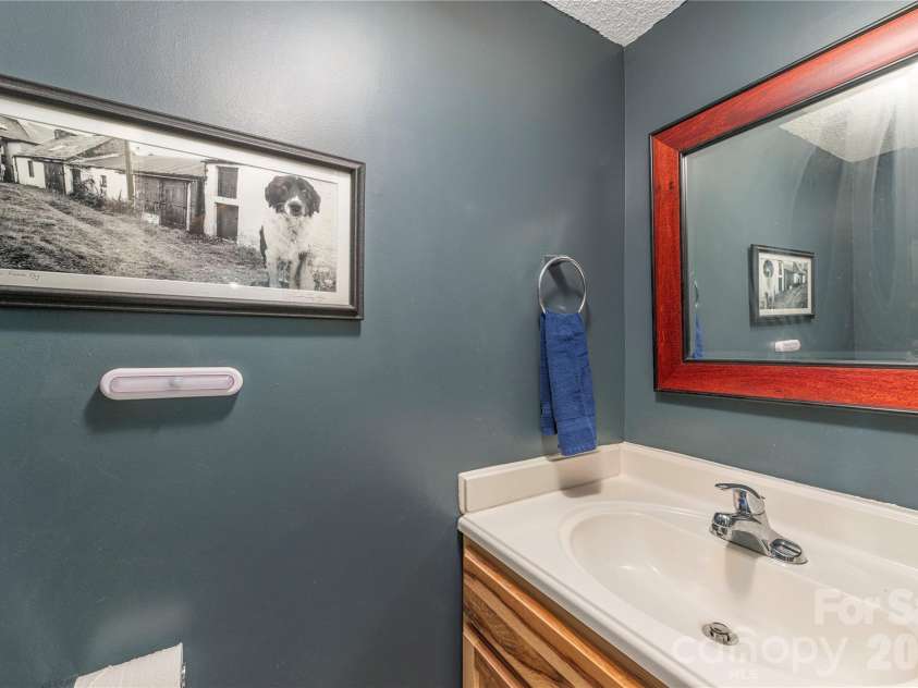 11 Maple Ridge Lane, Asheville, NC 28806.  MLS# CAR4420980, YatesRealty ID 48845. Half bath on main level