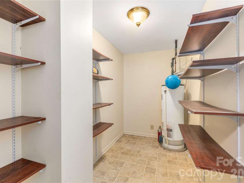 11 Maple Ridge Lane, Asheville, NC 28806.  MLS# CAR4420980, YatesRealty ID 48845. More storage in basement den.