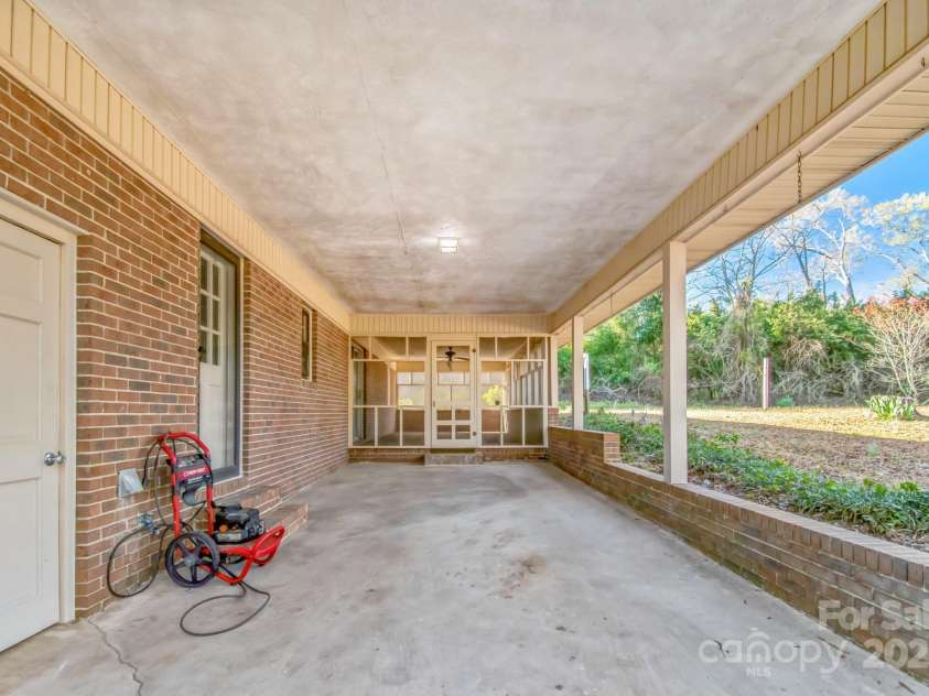 407 Covington Street, Rockingham, NC 28379.  MLS# CAR4237436, YatesRealty ID 4885. Car port