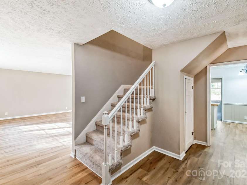 407 Covington Street, Rockingham, NC 28379.  MLS# CAR4237436, YatesRealty ID 4885. FRONT FOYER AND STAIRS