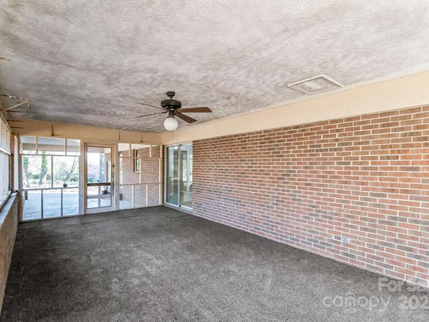 407 Covington Street, Rockingham, NC 28379.  MLS# CAR4237436, YatesRealty ID 4885. SCREEN IN PATIO