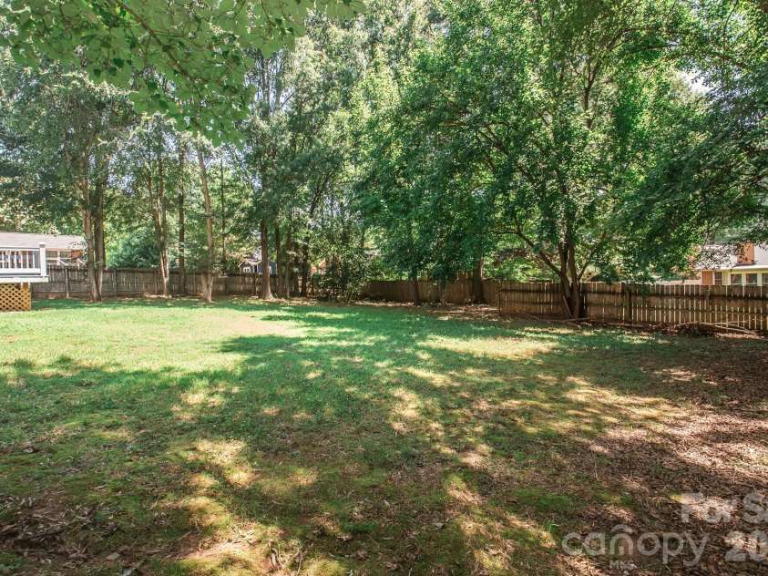 4456 Alexander Hill Court, Harrisburg, NC 28075.  MLS# CAR4404801, YatesRealty ID 48850. Backyard