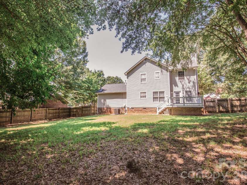 4456 Alexander Hill Court, Harrisburg, NC 28075.  MLS# CAR4404801, YatesRealty ID 48850. Backyard