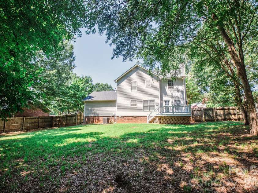 4456 Alexander Hill Court, Harrisburg, NC 28075.  MLS# CAR4404801, YatesRealty ID 48850. Backyard