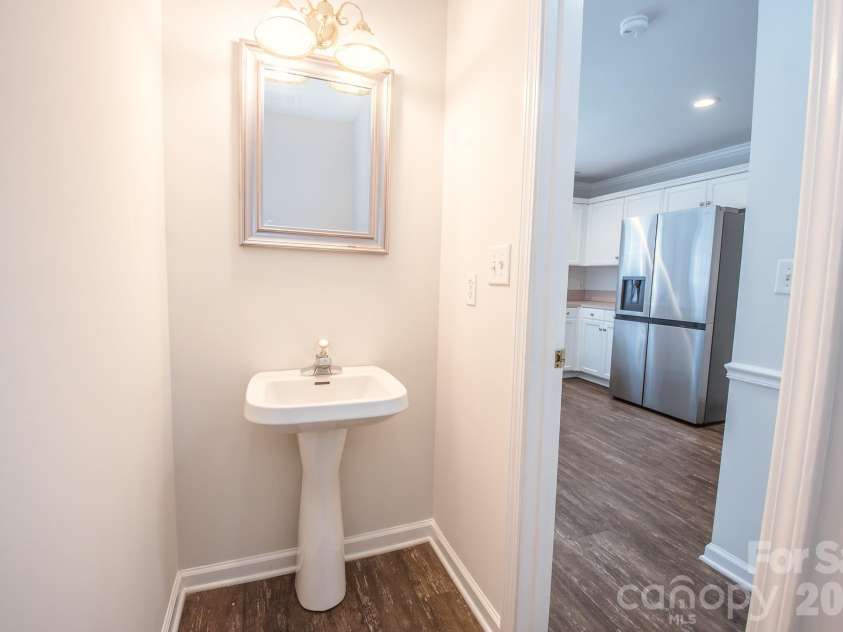4456 Alexander Hill Court, Harrisburg, NC 28075.  MLS# CAR4404801, YatesRealty ID 48850. Half bath down