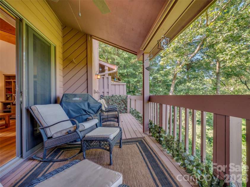 58 Timbertop Lane, Etowah, NC 28729.  MLS# CAR4421699, YatesRealty ID 48857. Back porch