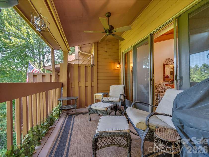 58 Timbertop Lane, Etowah, NC 28729.  MLS# CAR4421699, YatesRealty ID 48857. Back porch