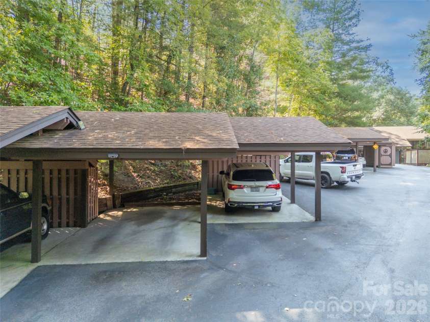 58 Timbertop Lane, Etowah, NC 28729.  MLS# CAR4421699, YatesRealty ID 48857. Carport