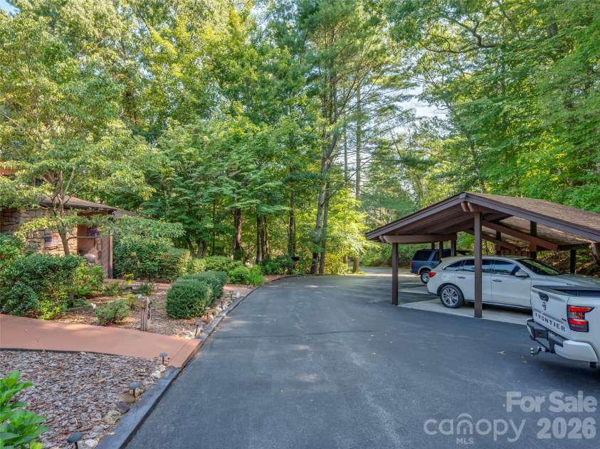 58 Timbertop Lane, Etowah, NC 28729.  MLS# CAR4421699, YatesRealty ID 48857. Carport Parking
