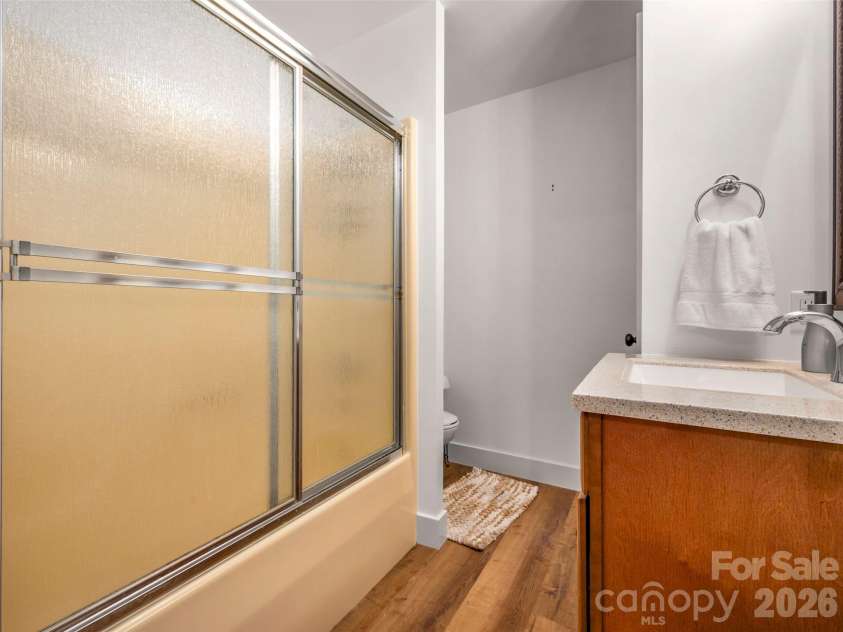 58 Timbertop Lane, Etowah, NC 28729.  MLS# CAR4421699, YatesRealty ID 48857. Downstairs Bathroom