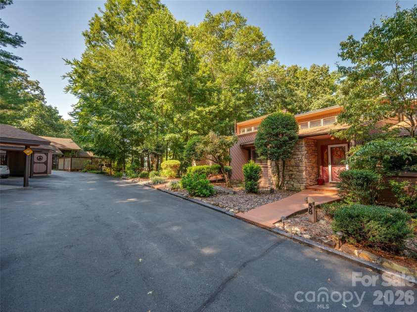 58 Timbertop Lane, Etowah, NC 28729.  MLS# CAR4421699, YatesRealty ID 48857. Side view of entrance