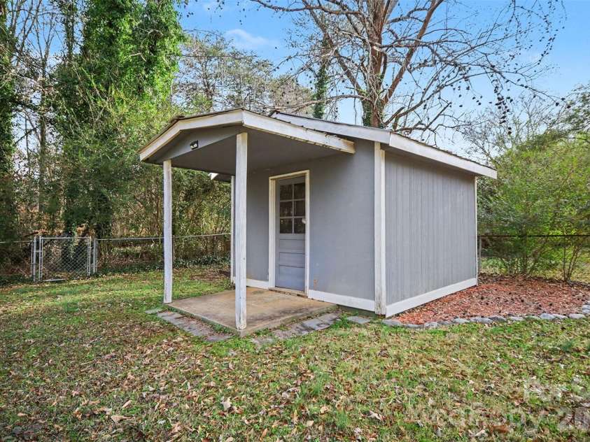 112 Lineberger Street, Stanley, NC 28164.  MLS# CAR4340100, YatesRealty ID 4887. Backyard storage shed