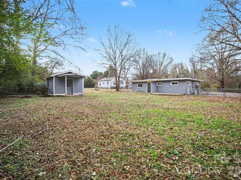 112 Lineberger Street, Stanley, NC 28164.  MLS# CAR4340100, YatesRealty ID 4887. Backyard w/ storage shed