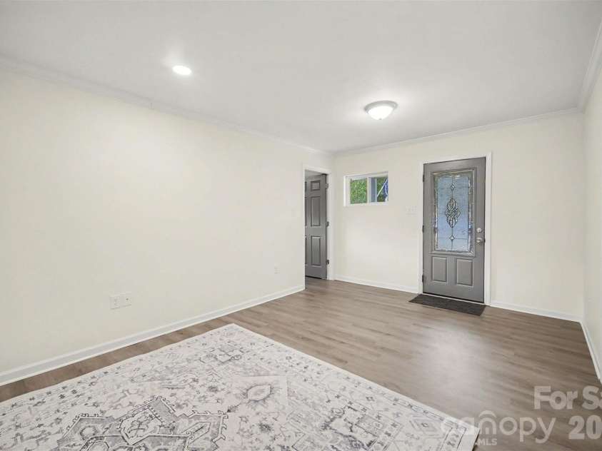 112 Lineberger Street, Stanley, NC 28164.  MLS# CAR4340100, YatesRealty ID 4887. Living Room