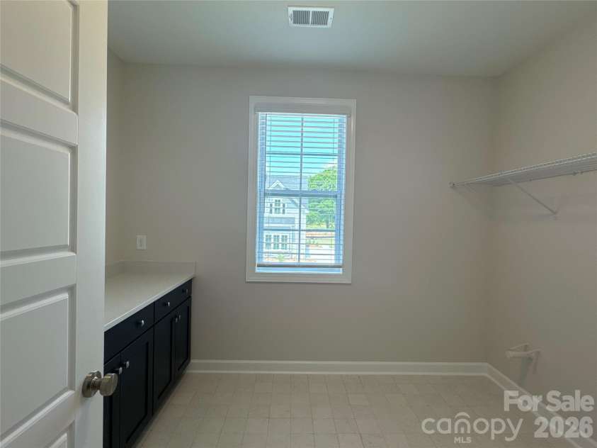 10914 Tyler Brook Lane, Mint Hill, NC 28227.  MLS# CAR4420244, YatesRealty ID 48871. Example Photo -  Laundry Room