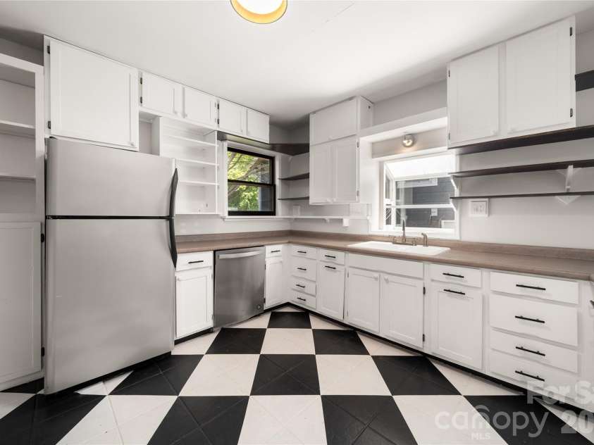 101 Olney Road, Asheville, NC 28806.  MLS# CAR4421259, YatesRealty ID 48879. So much storage and workspace in this large kitchen