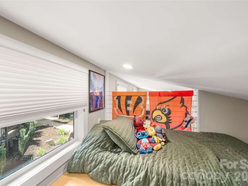 101 Olney Road, Asheville, NC 28806.  MLS# CAR4421259, YatesRealty ID 48879. Upper loft sleeping quarters