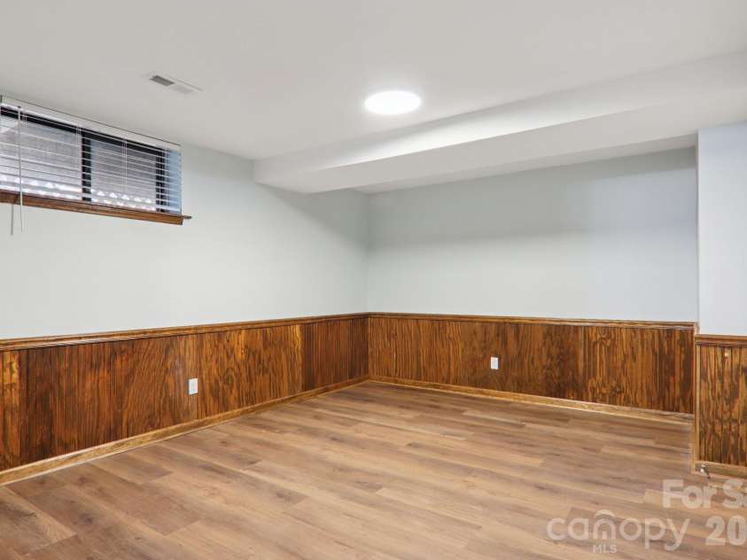 148 Lower Christ School Road, Fletcher, NC 28732.  MLS# CAR4347020, YatesRealty ID 4889. Basement Bonus Room