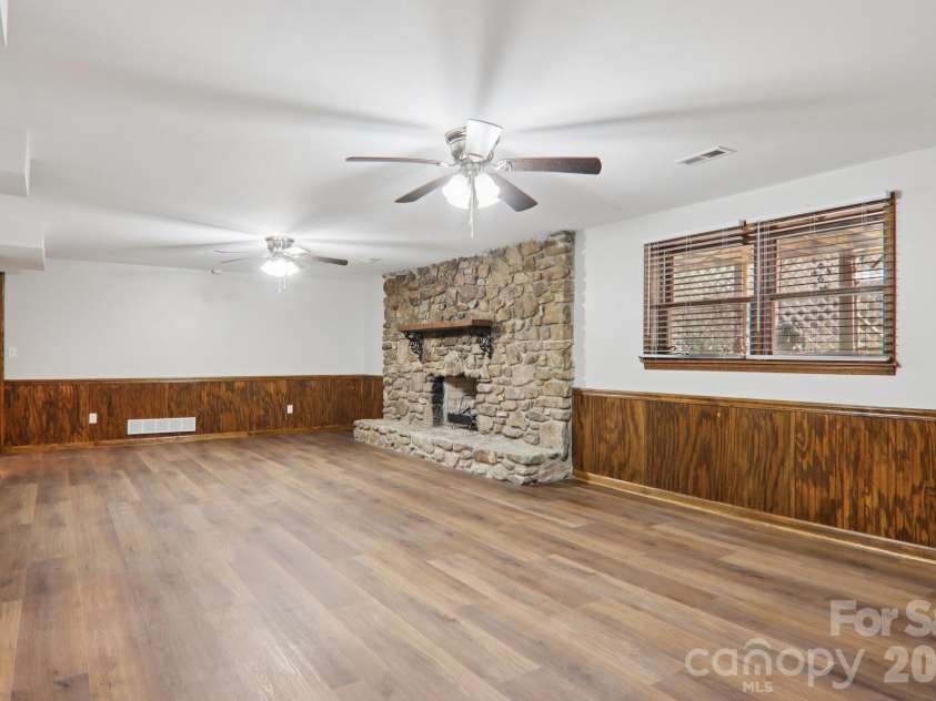 148 Lower Christ School Road, Fletcher, NC 28732.  MLS# CAR4347020, YatesRealty ID 4889. Basement Great Room