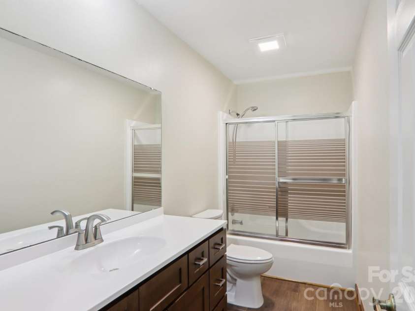 148 Lower Christ School Road, Fletcher, NC 28732.  MLS# CAR4347020, YatesRealty ID 4889. Hallway Bathroom