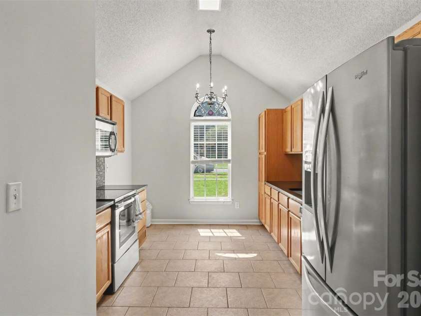 416 Mcginn Grove Drive, Charlotte, NC 28216.  MLS# CAR4421684, YatesRealty ID 48891. Kitchen - Stainless Refrigerator Included