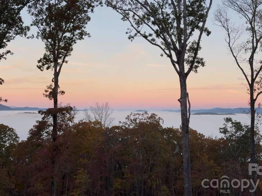 724 Grand Laurel Way, Brasstown, NC 28902.  MLS# CAR4420010, YatesRealty ID 48894. 
