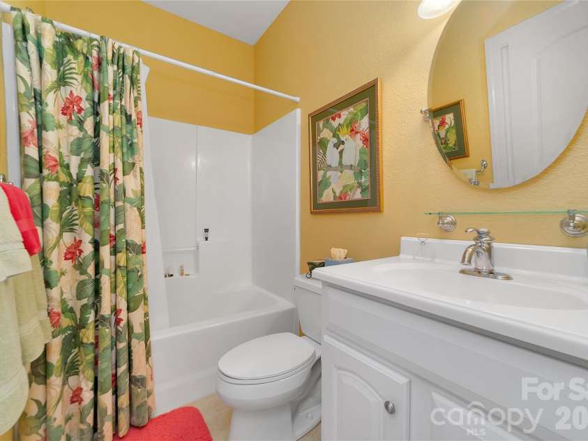 303 Wodigeasgohi Drive, Brevard, NC 28712.  MLS# CAR4419106, YatesRealty ID 48899. Lower level 2nd bath