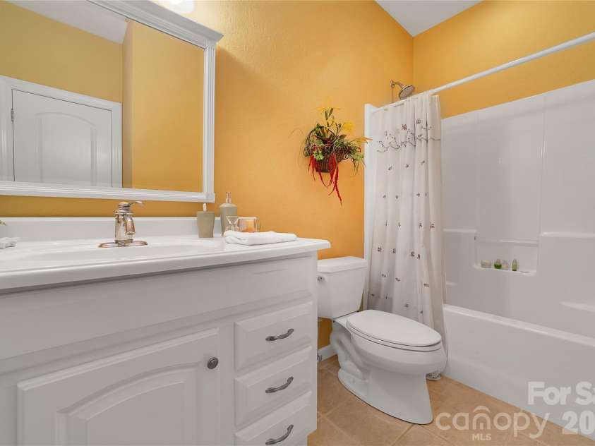 303 Wodigeasgohi Drive, Brevard, NC 28712.  MLS# CAR4419106, YatesRealty ID 48899. Lower level ensuite