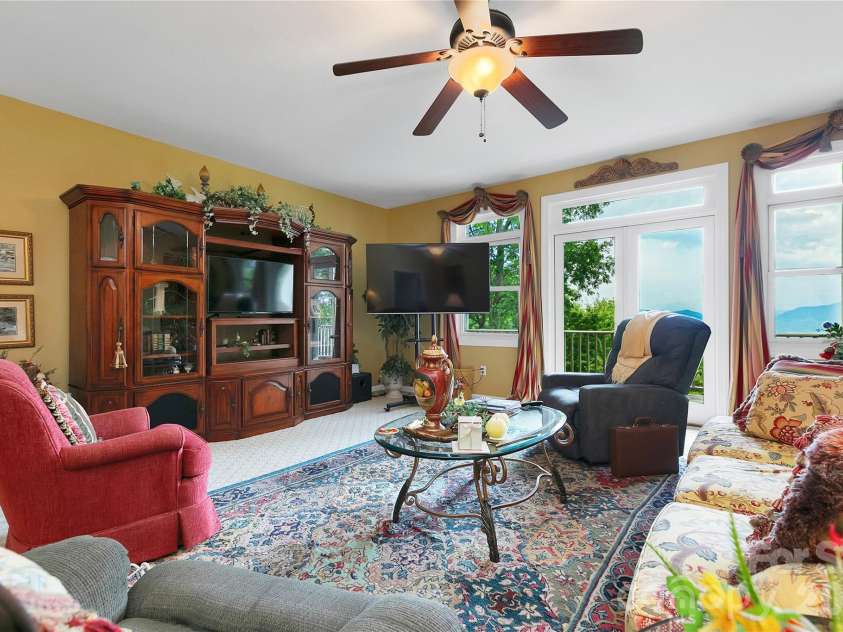 303 Wodigeasgohi Drive, Brevard, NC 28712.  MLS# CAR4419106, YatesRealty ID 48899. Lower level living