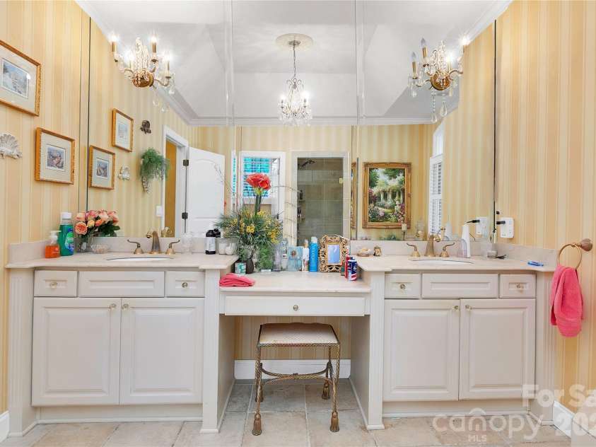 303 Wodigeasgohi Drive, Brevard, NC 28712.  MLS# CAR4419106, YatesRealty ID 48899. Primary bath vanity