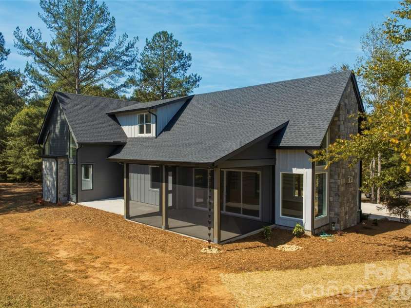 2303 Paddock Circle, Morganton, NC 28655.  MLS# CAR4416605, YatesRealty ID 48902. The back patio is screened and there are charming rain chains instead of traditional gutter downspouts along the front and rear porches as well as by the garage.