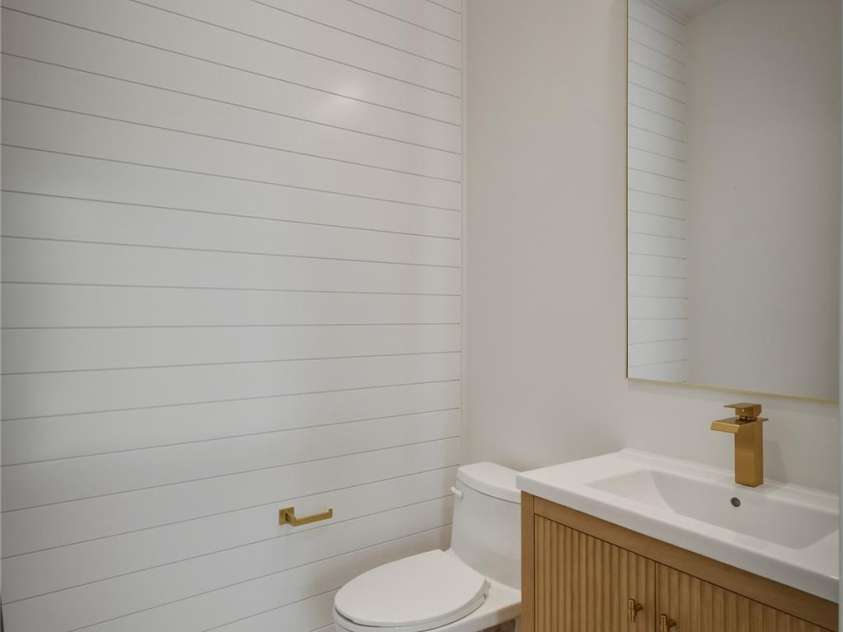 2303 Paddock Circle, Morganton, NC 28655.  MLS# CAR4416605, YatesRealty ID 48902. The final room on the main level is this powder room which also has a feature wall that dresses it up for your guests.