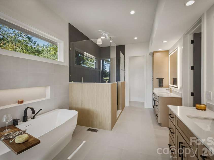 2303 Paddock Circle, Morganton, NC 28655.  MLS# CAR4416605, YatesRealty ID 48902. The owners' suite bathroom will remind you of a spa!