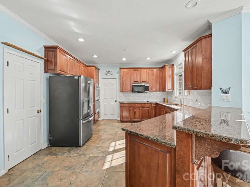 1538 Wickerby Court, Matthews, NC 28105.  MLS# CAR4417809, YatesRealty ID 48908. 